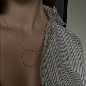 Necklace  circle silver colour .